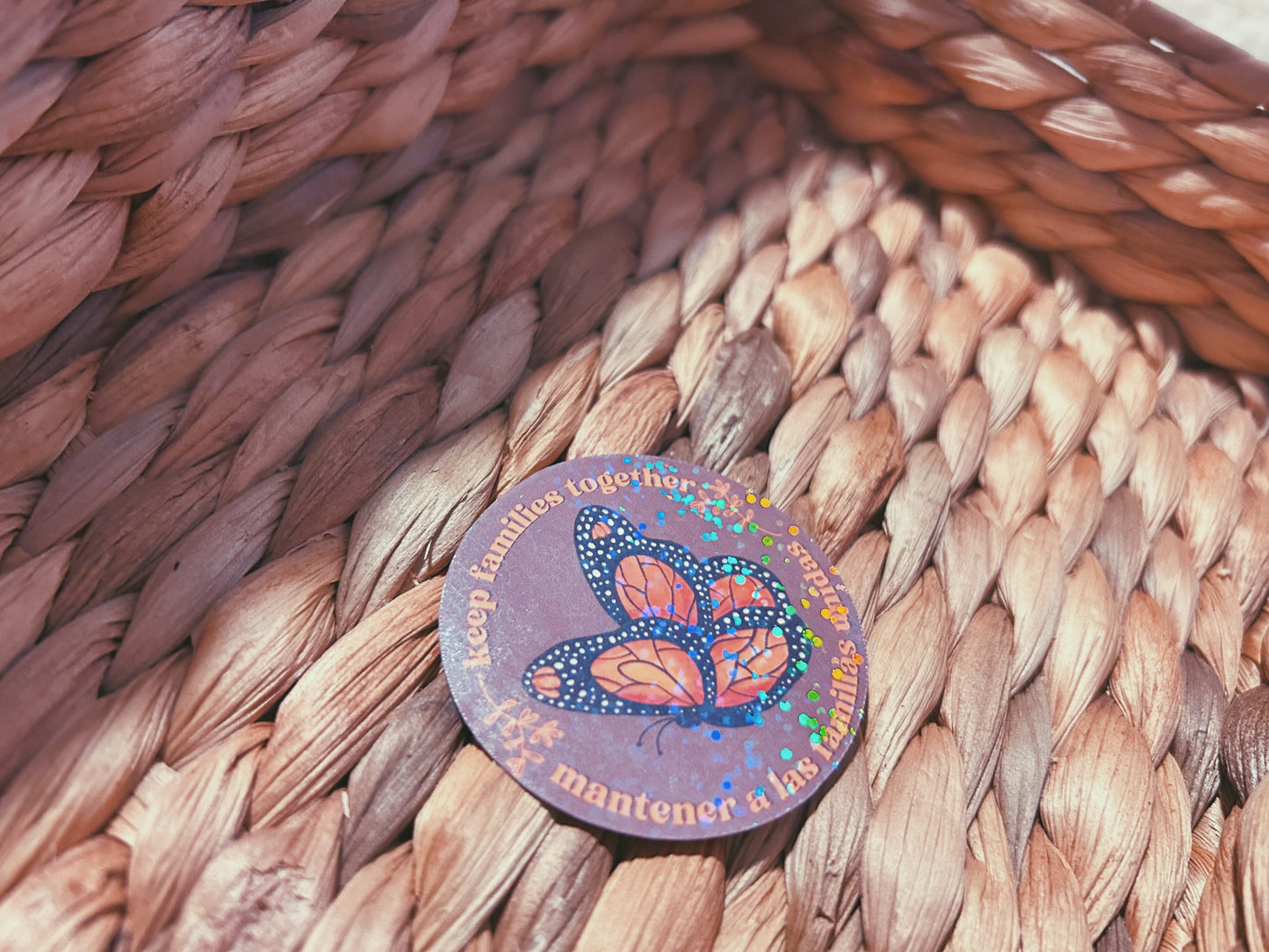 monarch butterfly "keep families together" sticker  |  english and spanish floral holographic sticker (CHIRLA collection)