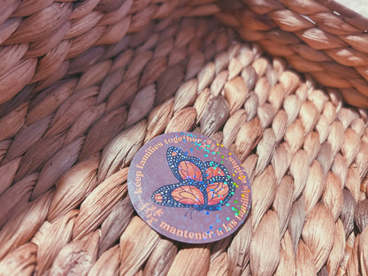 monarch butterfly "keep families together" sticker  |  english and spanish floral holographic sticker (CHIRLA collection)