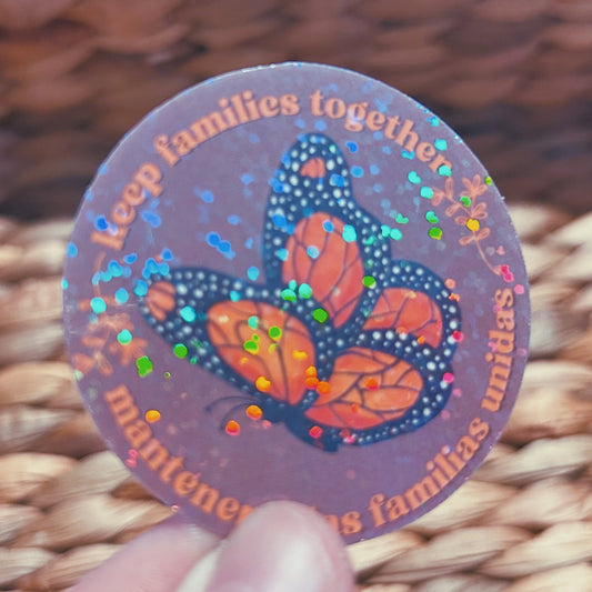 monarch butterfly "keep families together" sticker  |  english and spanish floral holographic sticker (CHIRLA collection)