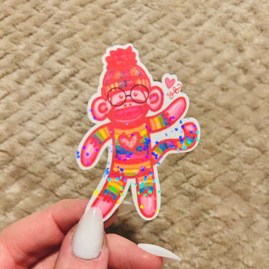 holographic rainbow sock monkey sticker | rainbow lgbtqia+ pride sticker
