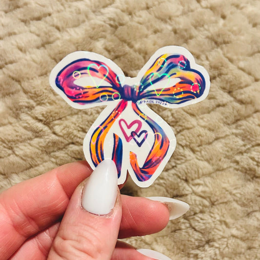 holographic rainbow coquette bow sticker | gay coquette rainbow lgbtqia+ pride sticker